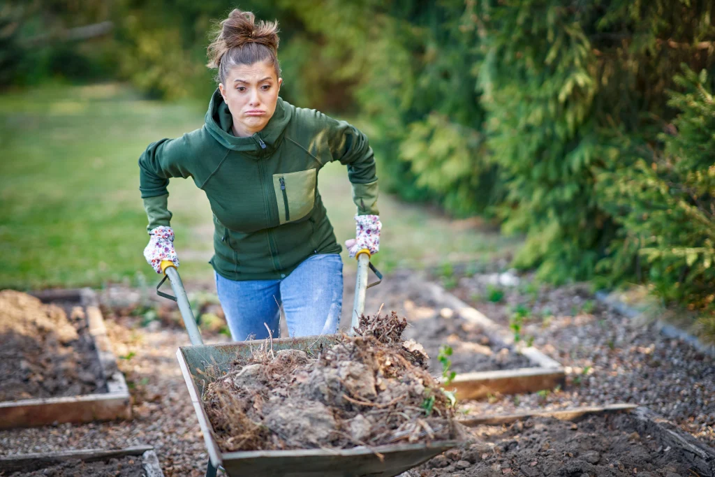 picture-of-tired-woman-working-with-tools-in-the-garden